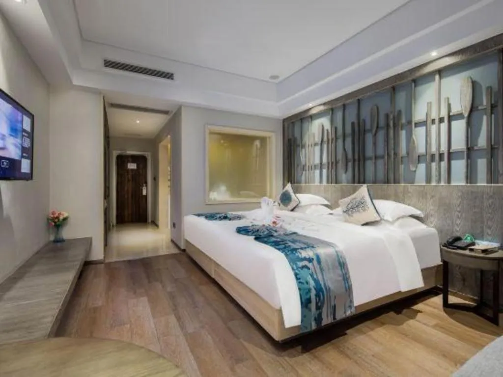 Bed in HuangMa holiday yacht view sea resort hotel