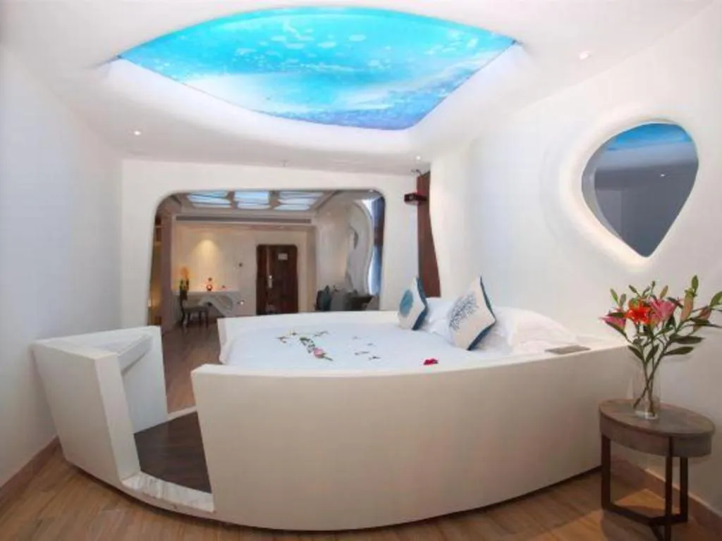 Bed in HuangMa holiday yacht view sea resort hotel