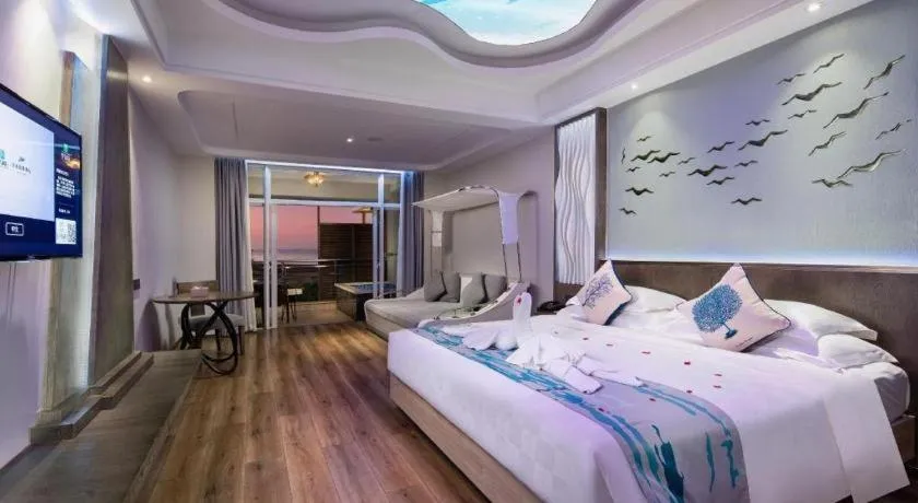 Bed in HuangMa holiday yacht view sea resort hotel