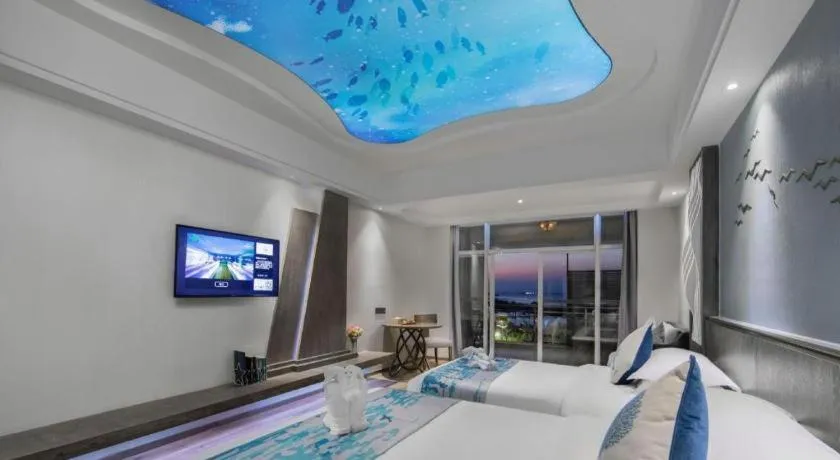 Bed in HuangMa holiday yacht view sea resort hotel