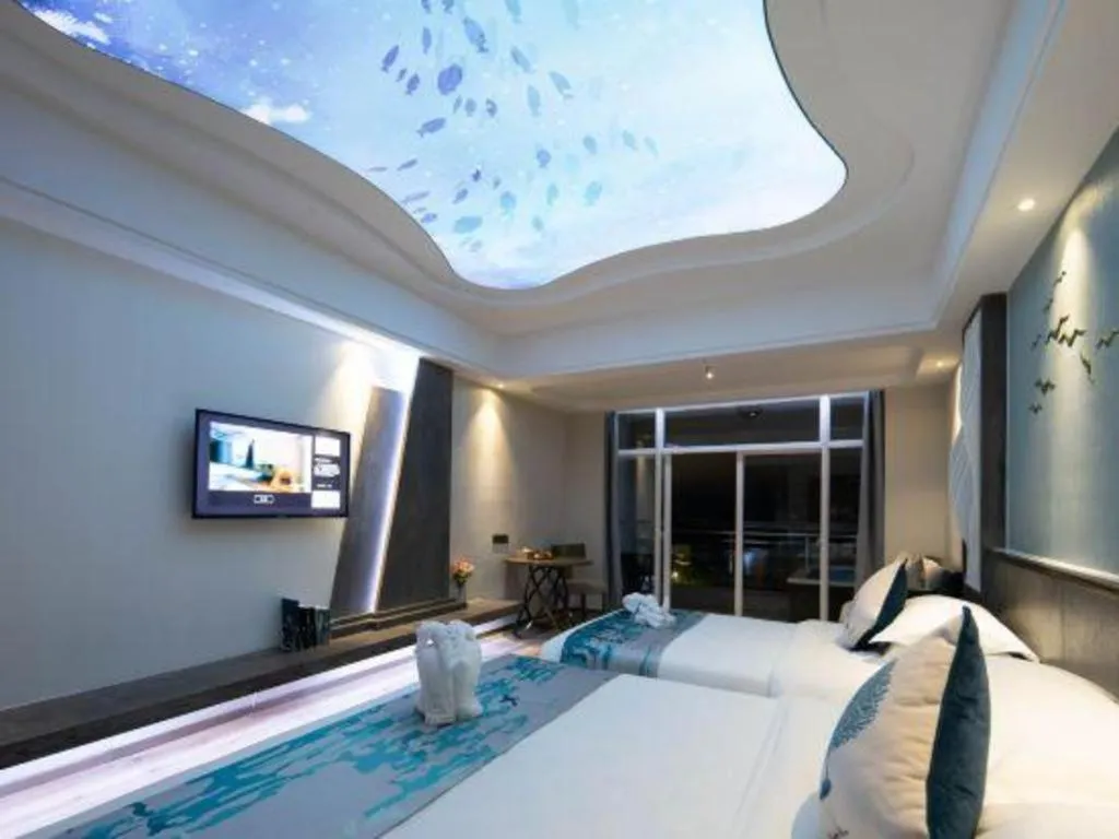 Bed in HuangMa holiday yacht view sea resort hotel