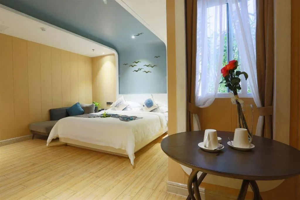 Bed in HuangMa holiday yacht view sea resort hotel