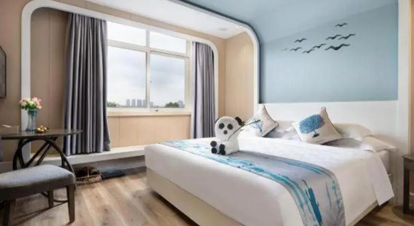 Bed in HuangMa holiday yacht view sea resort hotel