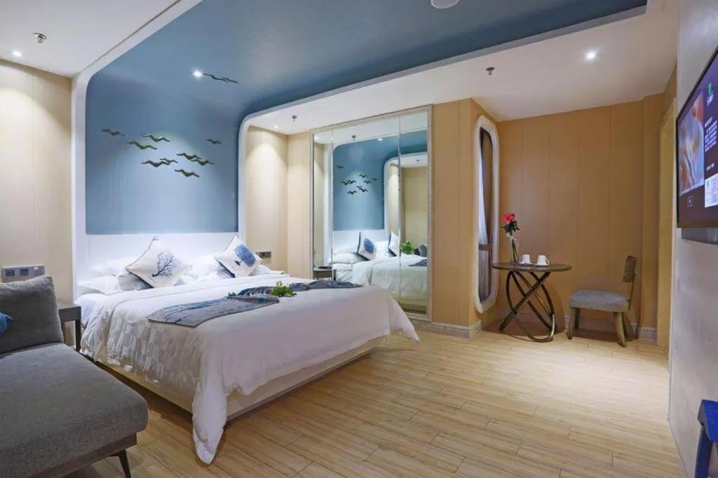 Bed in HuangMa holiday yacht view sea resort hotel