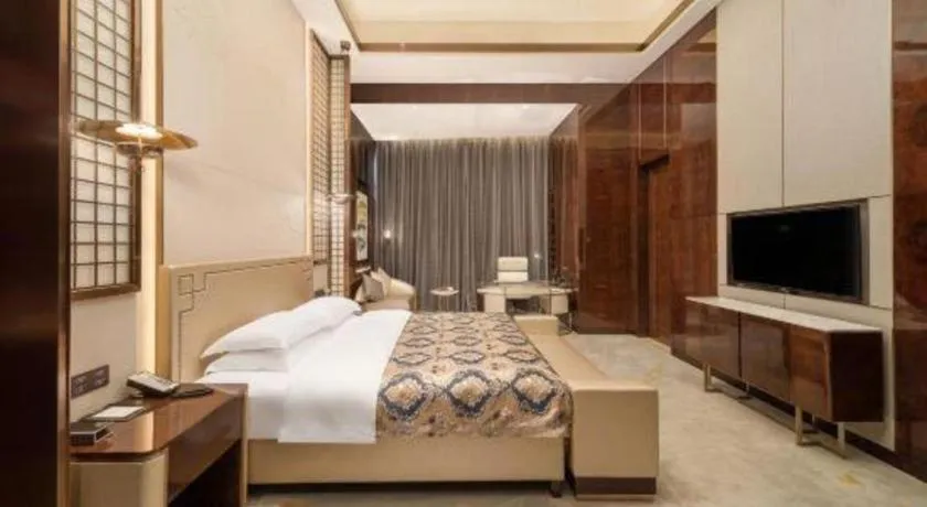 Bed in ZHONG DING HOTEL