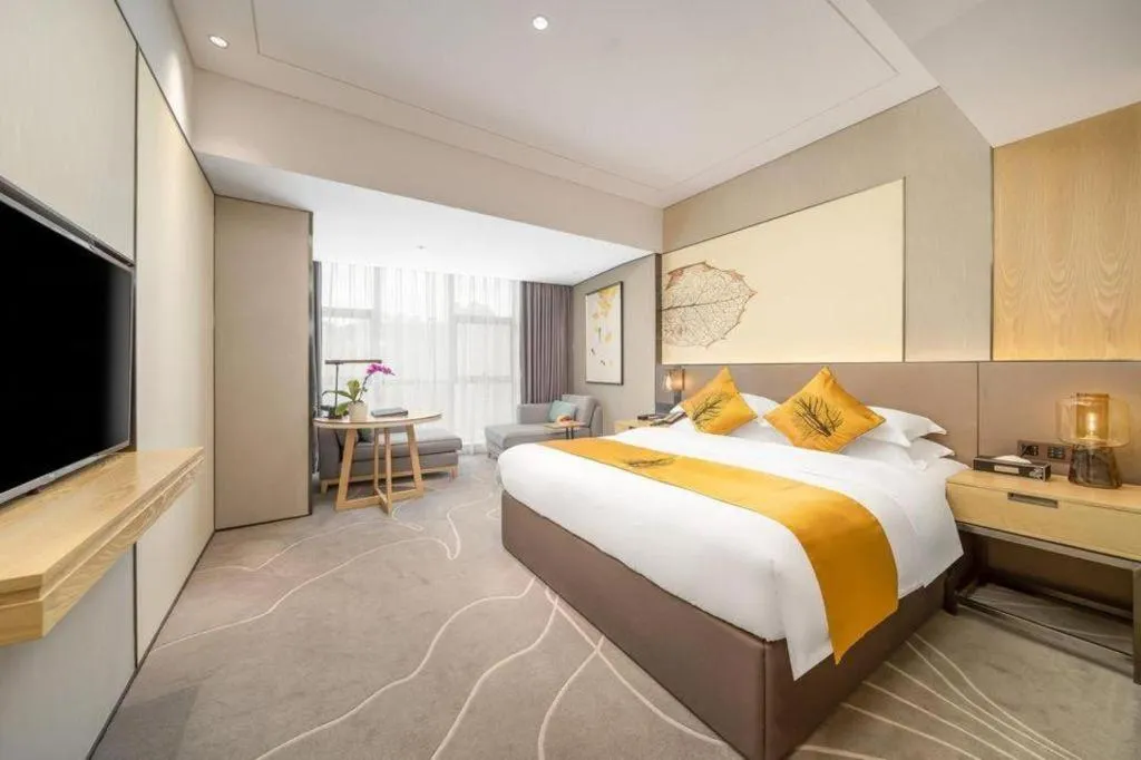 Bed in ZHONG DING HOTEL