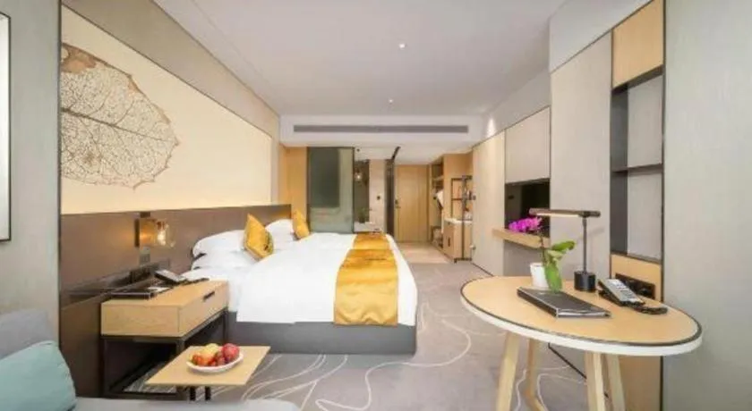 Bed in ZHONG DING HOTEL