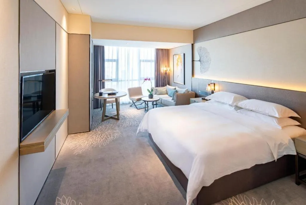 Bed in ZHONG DING HOTEL