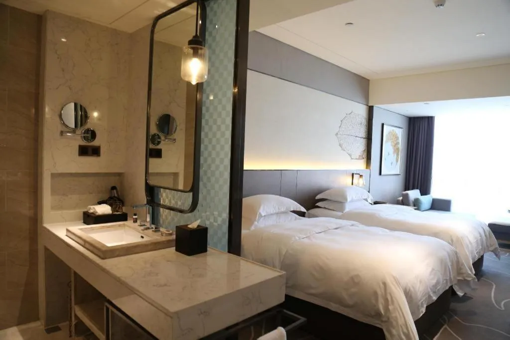 Bed in ZHONG DING HOTEL