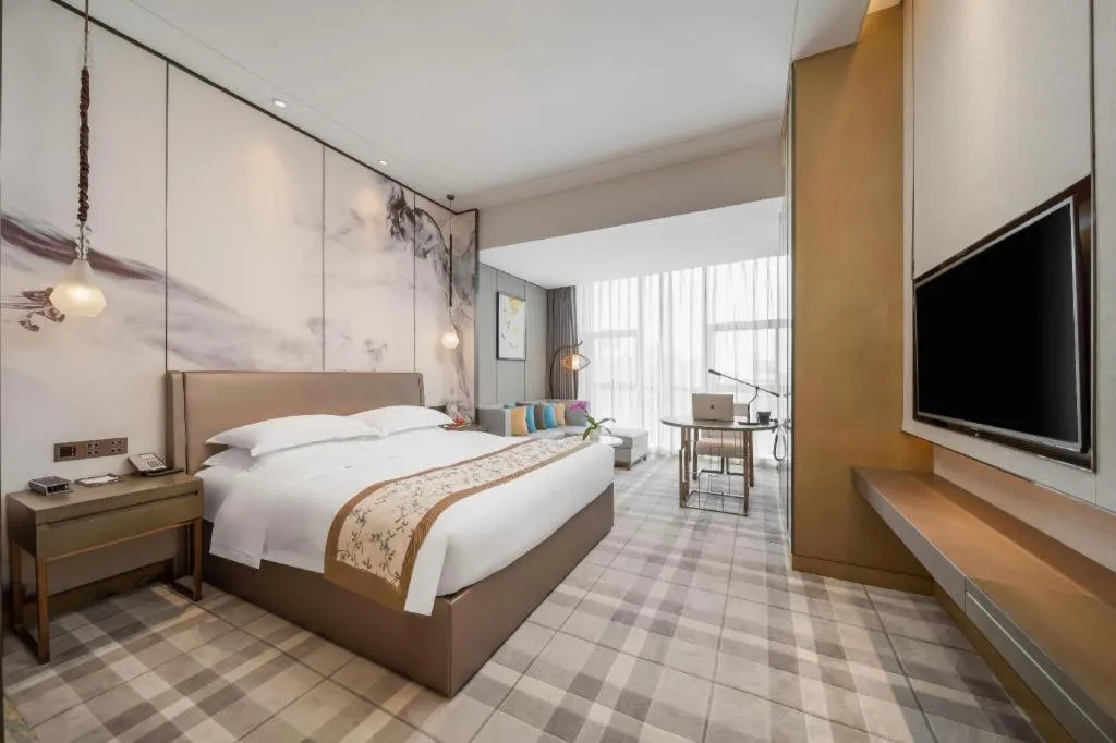 Bed in ZHONG DING HOTEL