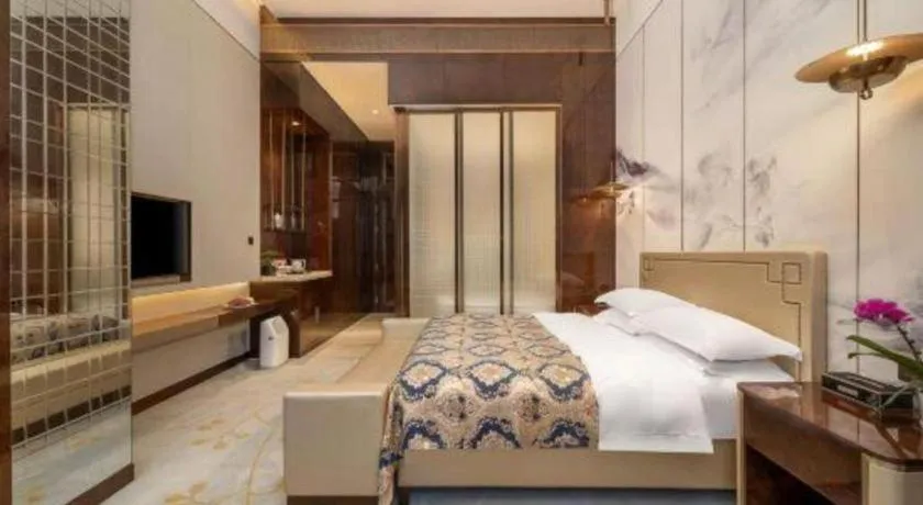 Bed in ZHONG DING HOTEL