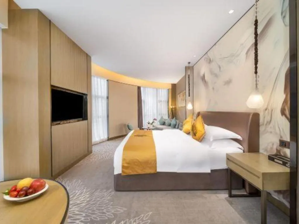 Bed in ZHONG DING HOTEL