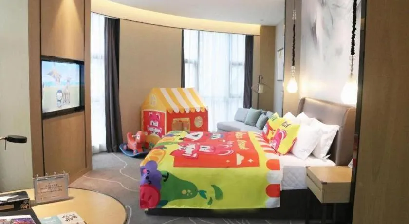 Bed in ZHONG DING HOTEL