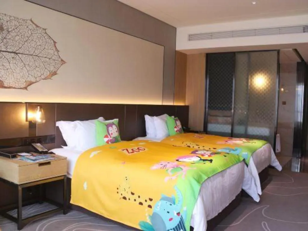 Bed in ZHONG DING HOTEL