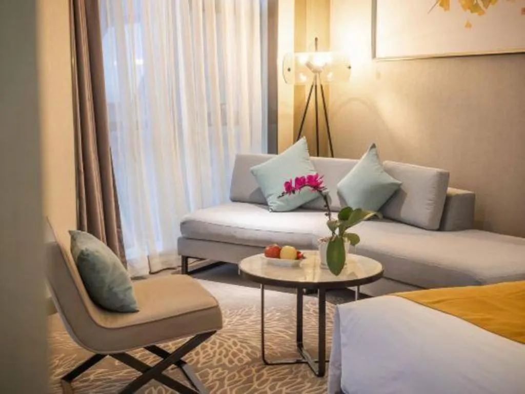 Bed in ZHONG DING HOTEL