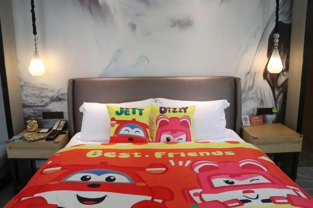 Bed in ZHONG DING HOTEL