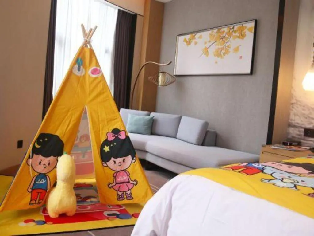 Bed in ZHONG DING HOTEL