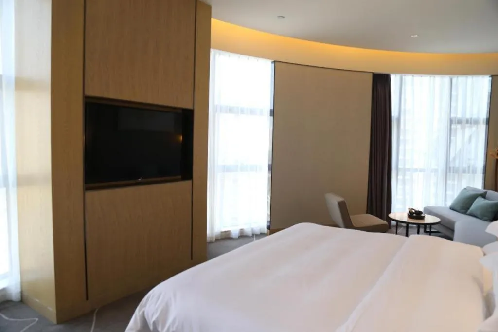 Bed in ZHONG DING HOTEL