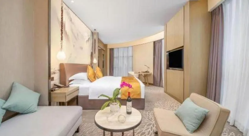 Bed in ZHONG DING HOTEL