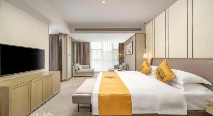 Bed in ZHONG DING HOTEL