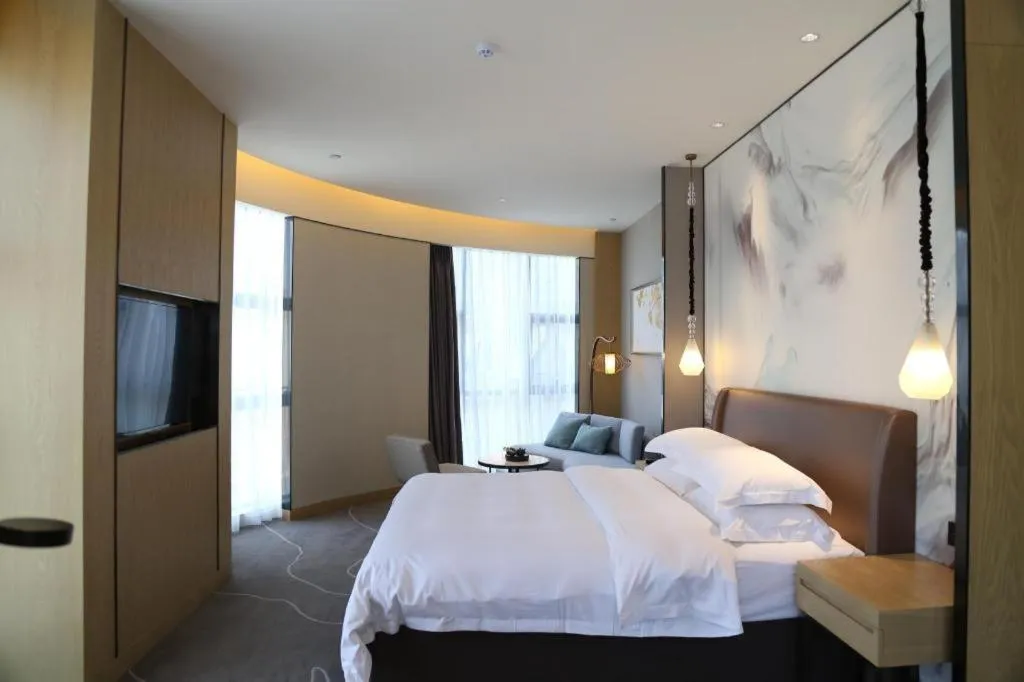 Bed in ZHONG DING HOTEL