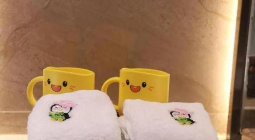 Bed in ZHONG DING HOTEL