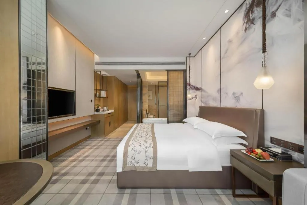 Bed in ZHONG DING HOTEL