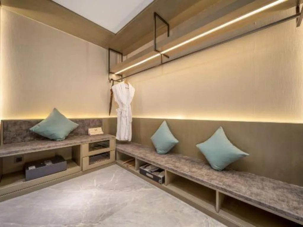 Bed in ZHONG DING HOTEL