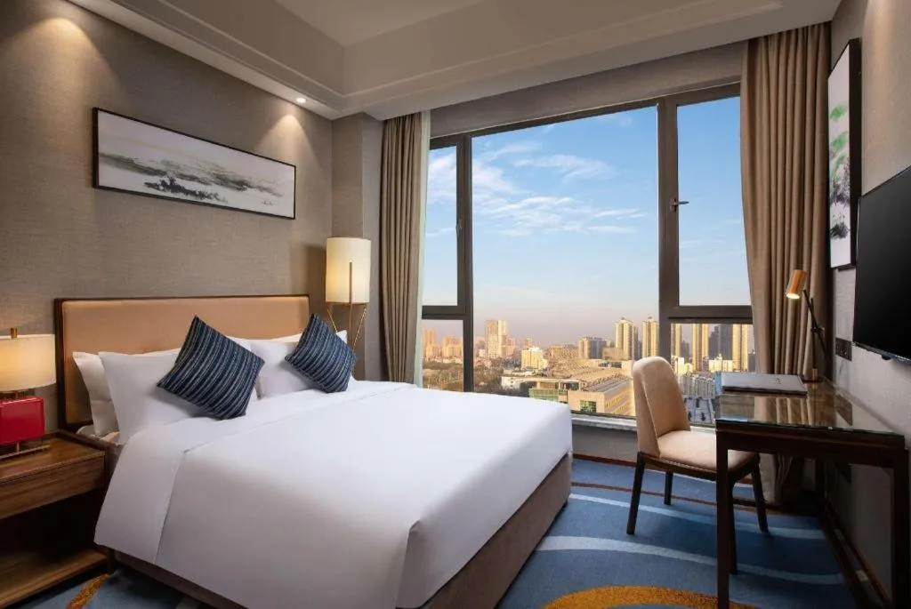 Bed in Ramada Encore by Wyndham Wuhan Caidian