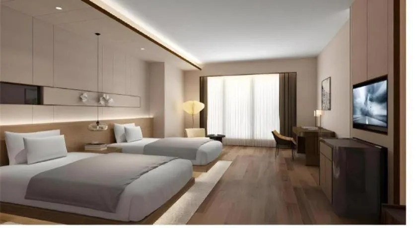 Bed in Metropolo Hotel YunNan Shangri-la Karma Dan Songzanlin Temple