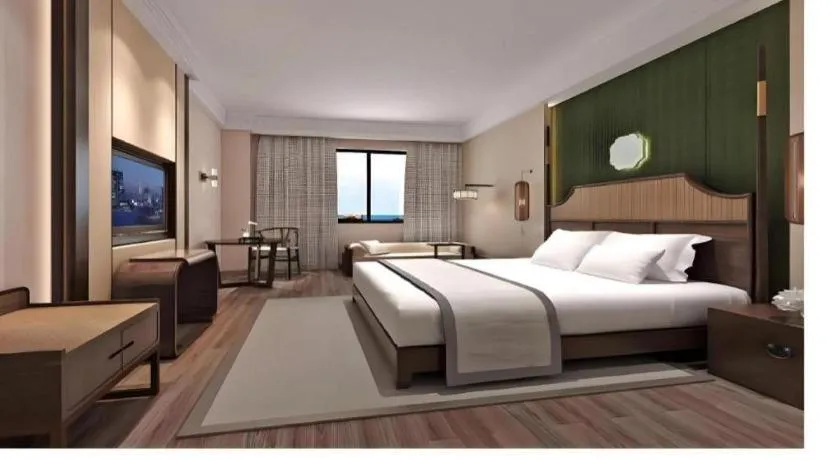 Bed in Metropolo Hotel YunNan Shangri-la Karma Dan Songzanlin Temple