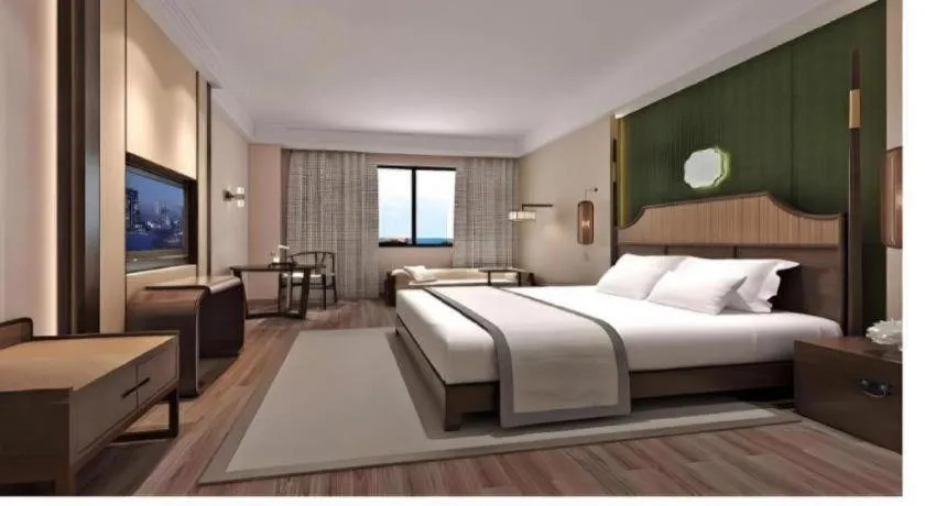 Bed in Metropolo Hotel YunNan Shangri-la Karma Dan Songzanlin Temple