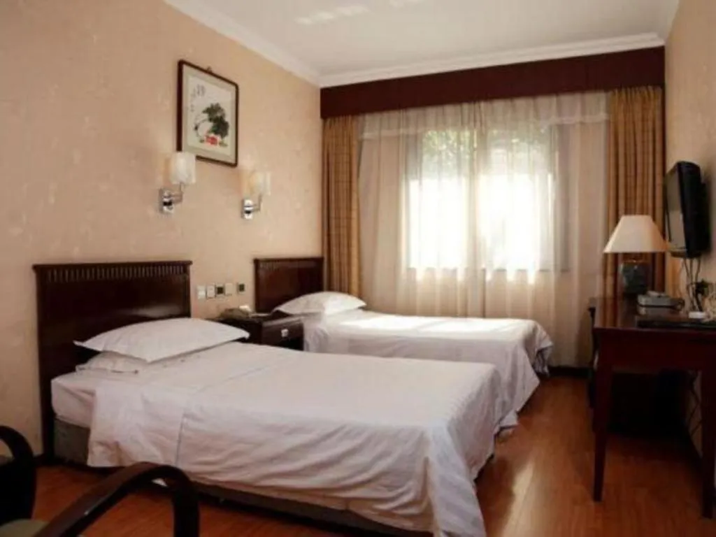 Bed in Hujialou Hot Spring Hotel