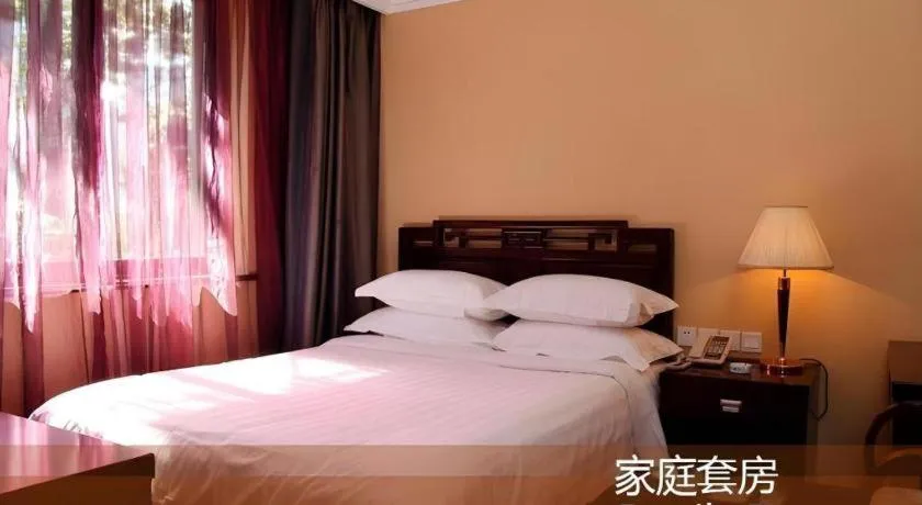 Bed in Hujialou Hot Spring Hotel