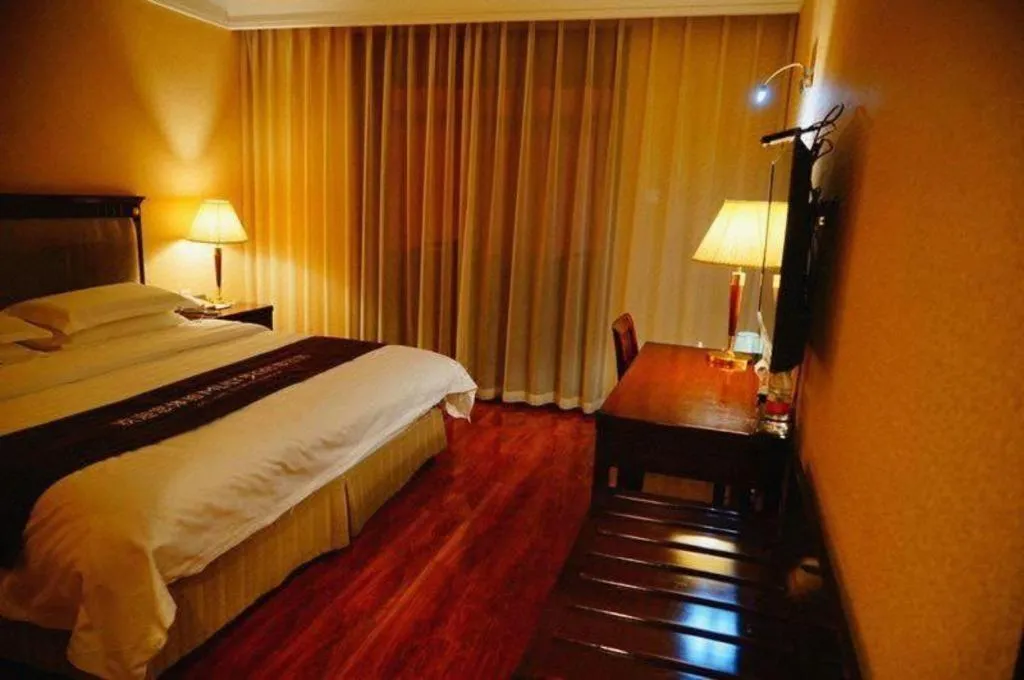 Bed in Hujialou Hot Spring Hotel