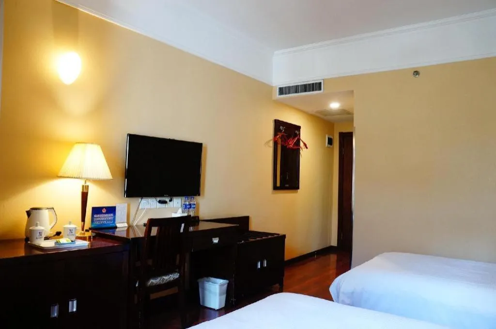 Bed in Hujialou Hot Spring Hotel