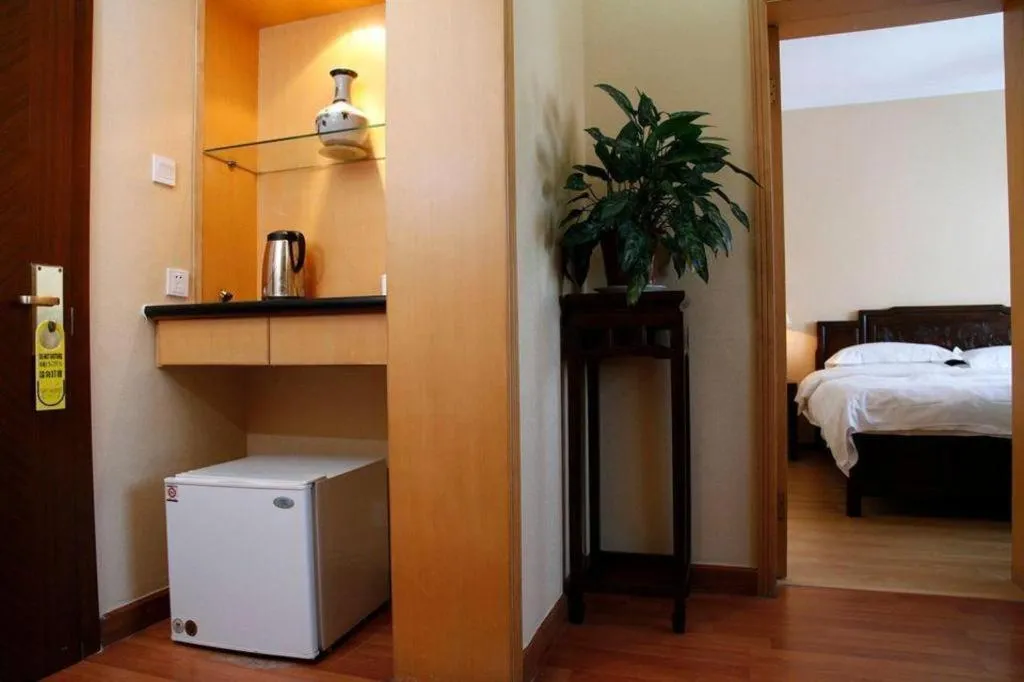 Bed in Hujialou Hot Spring Hotel