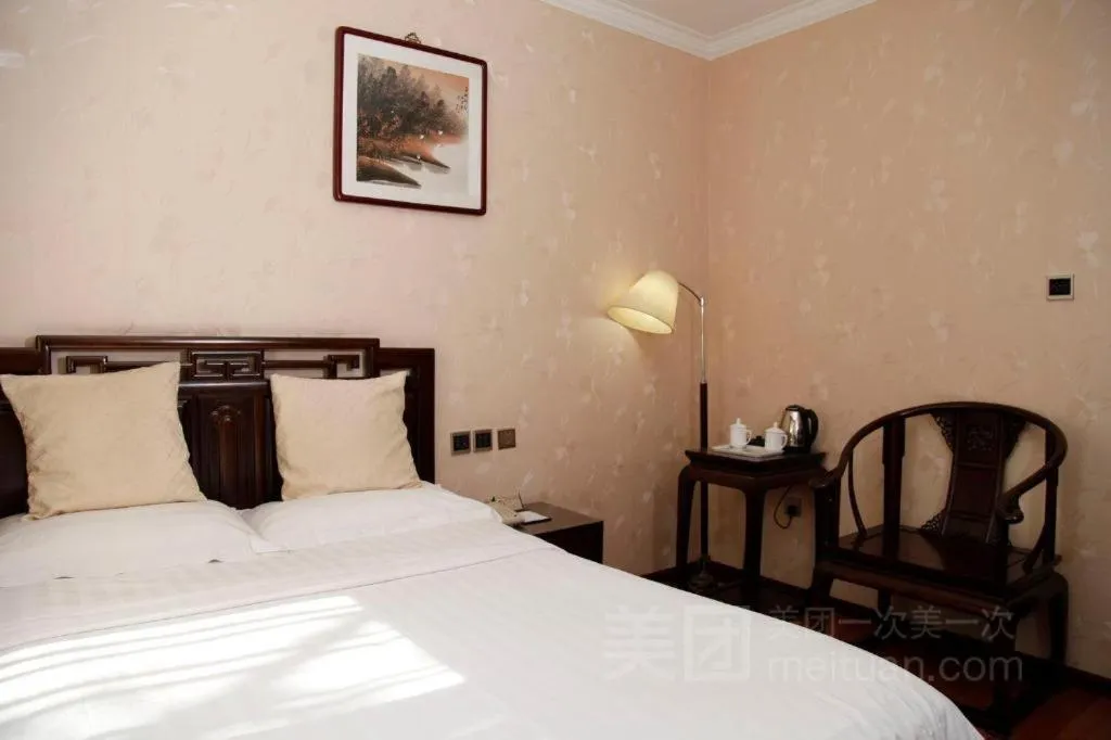 Bed in Hujialou Hot Spring Hotel