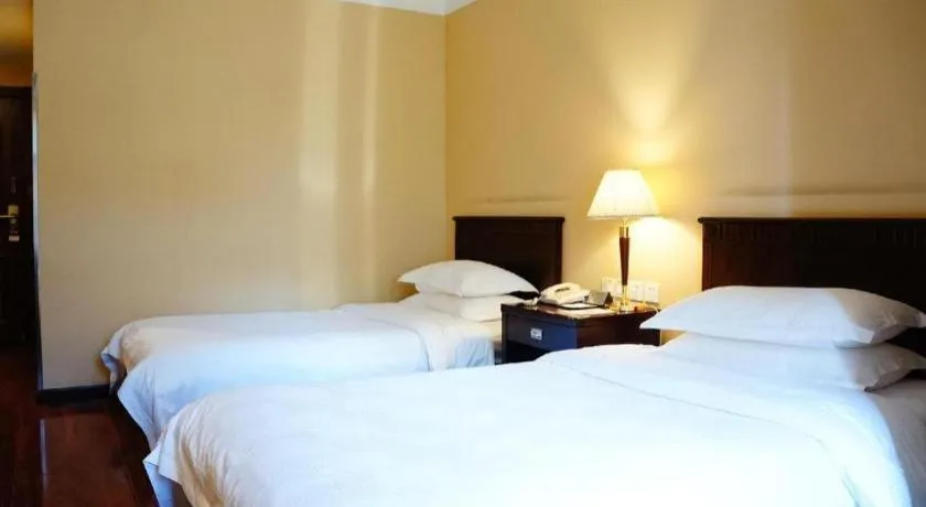 Bed in Hujialou Hot Spring Hotel