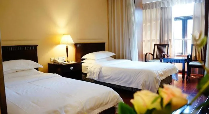 Bed in Hujialou Hot Spring Hotel