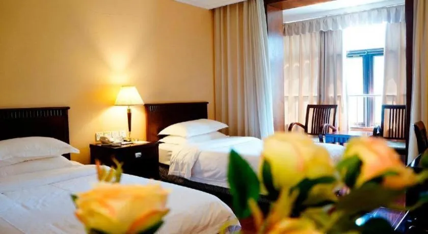 Bed in Hujialou Hot Spring Hotel