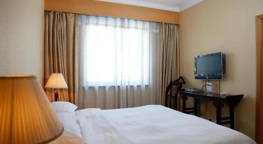 Bed in Hujialou Hot Spring Hotel