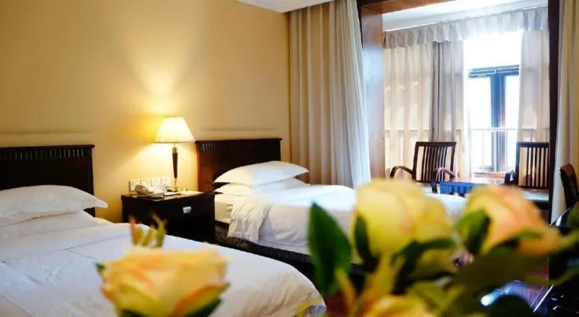 Bed in Hujialou Hot Spring Hotel