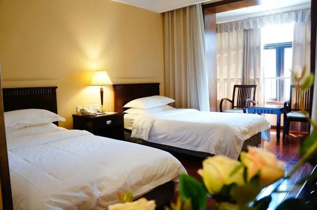 Bed in Hujialou Hot Spring Hotel