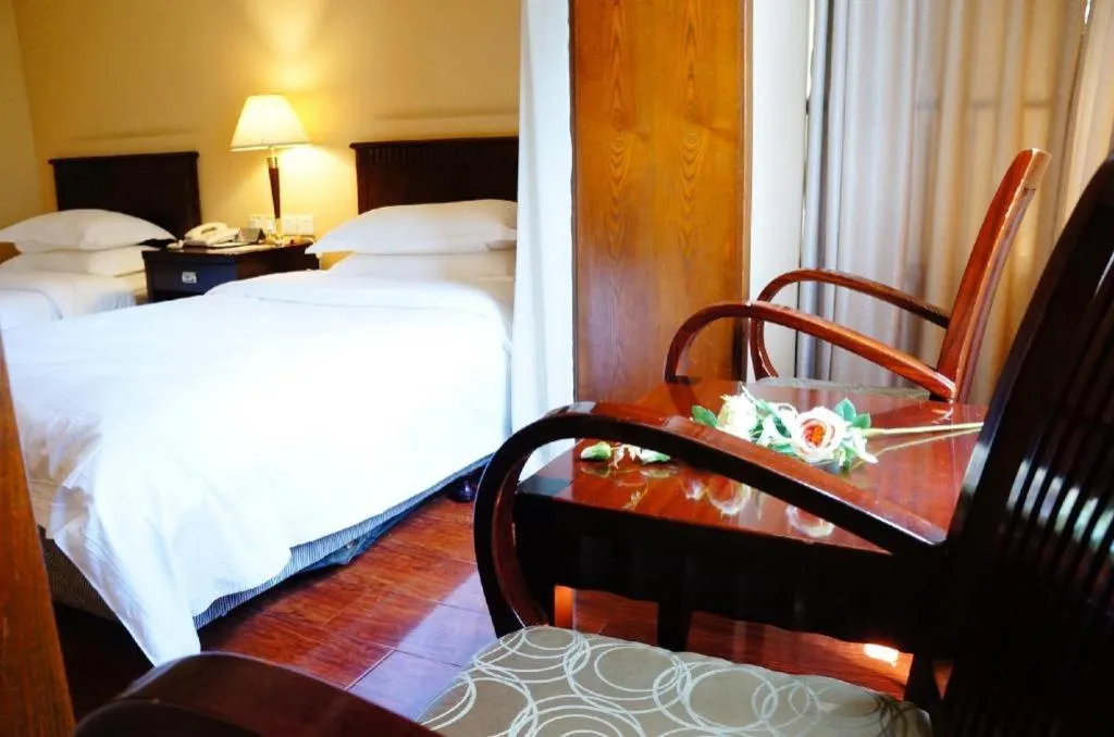 Bed in Hujialou Hot Spring Hotel