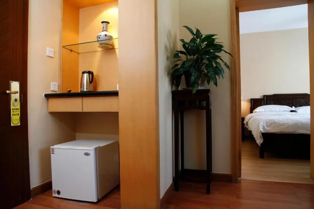 Bed in Hujialou Hot Spring Hotel