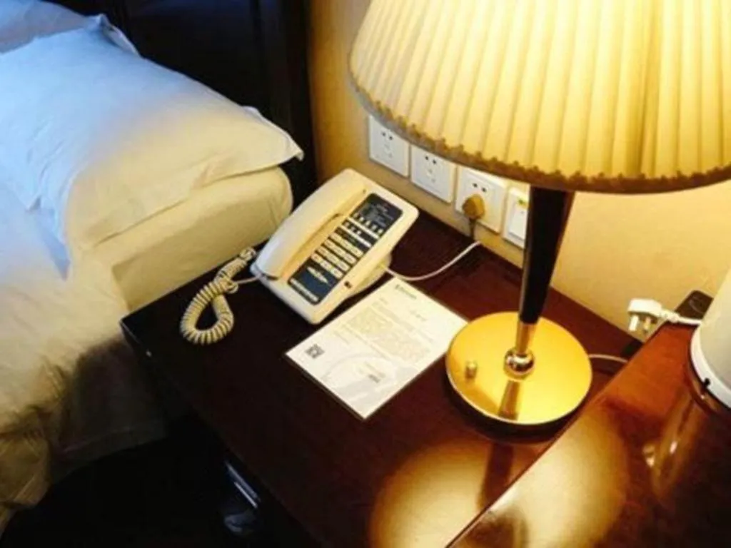 Bed in Hujialou Hot Spring Hotel