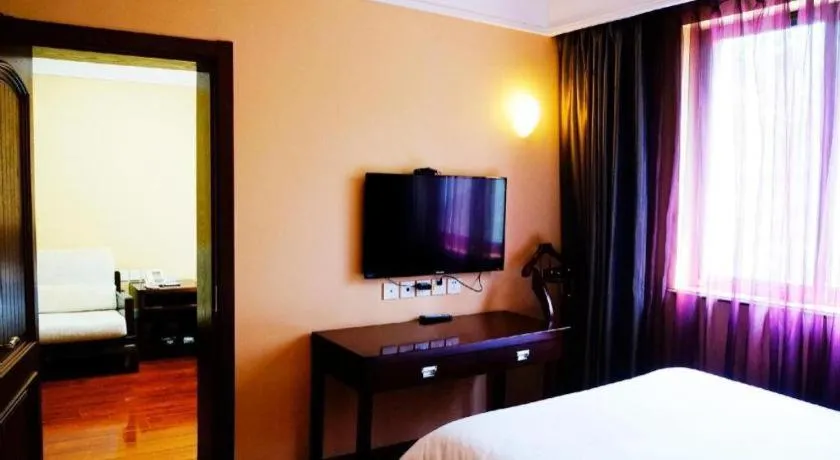 Bed in Hujialou Hot Spring Hotel