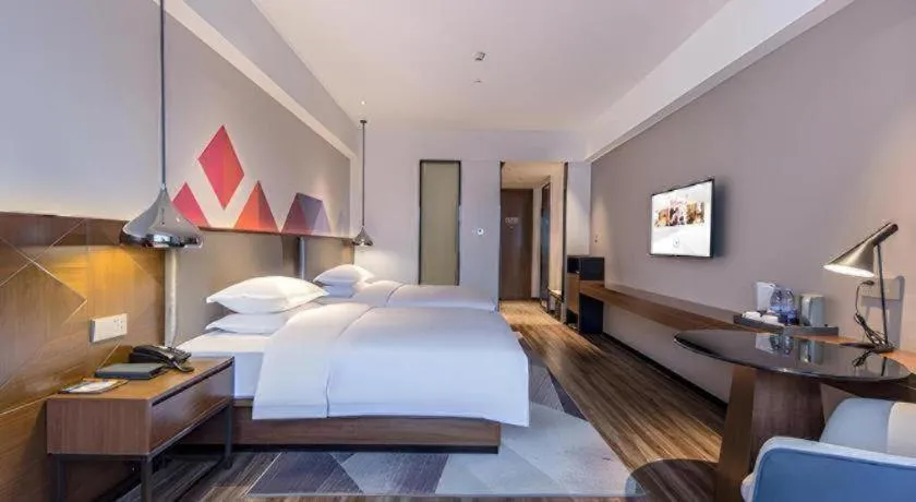 Bed in Borrman Hotel Nanning Railway Station