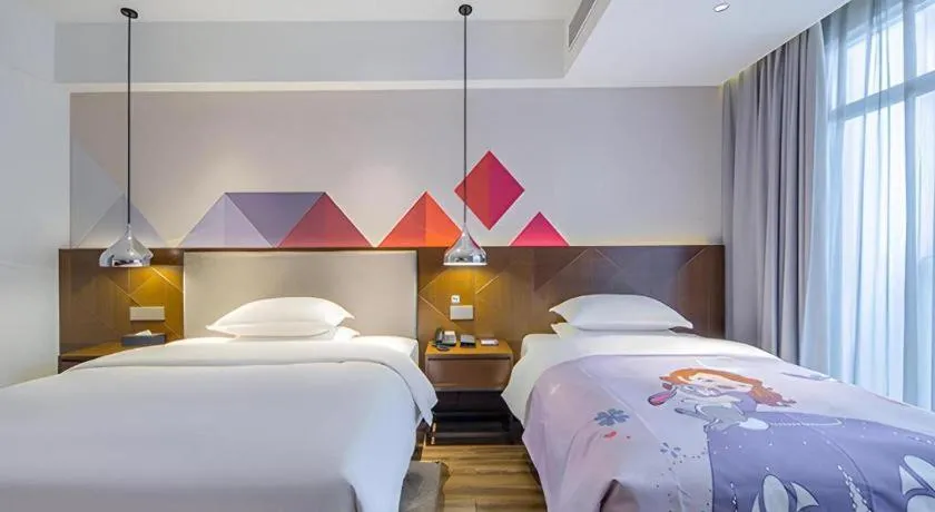 Bed in Borrman Hotel Nanning Railway Station